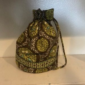 Vera Bradley dirty bag sitting in a tree cinch
